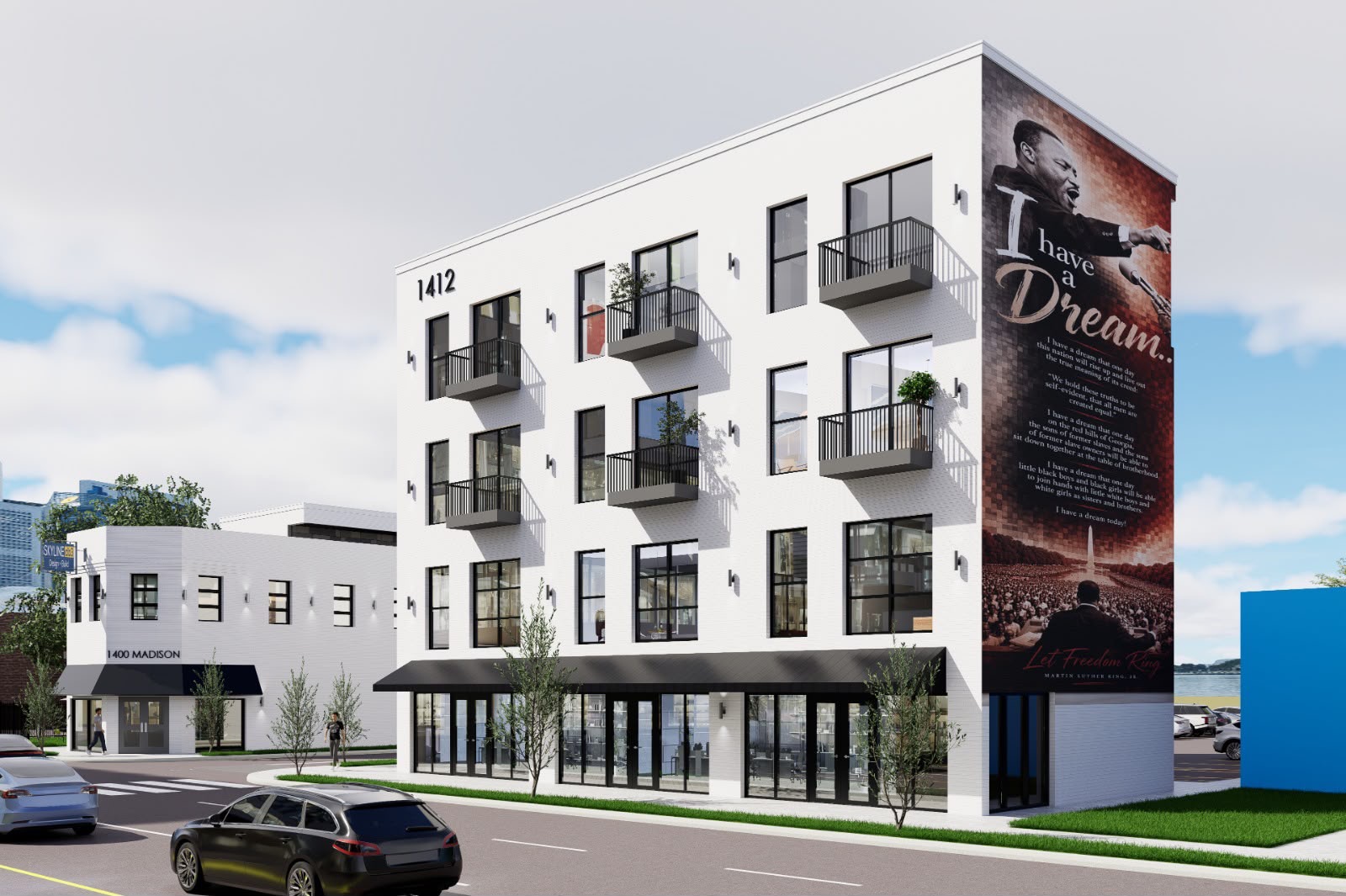 Rendering of the Phase Two building at 1412 Madison Avenue, a four-story white-brick mixed-use structure with balconies and ground-floor storefronts alongside the Phase One building